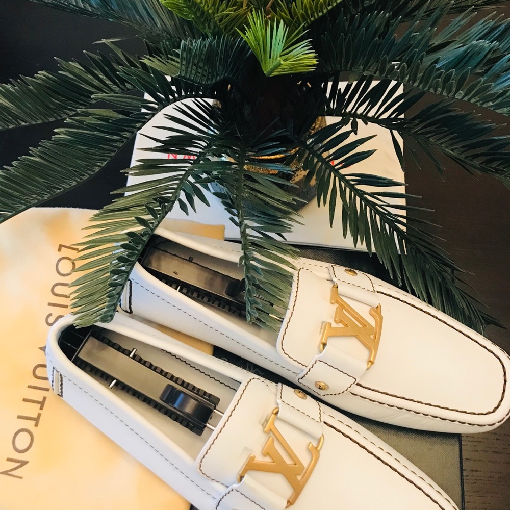 Louis Vuitton - size 7 - 99% new. Used twice